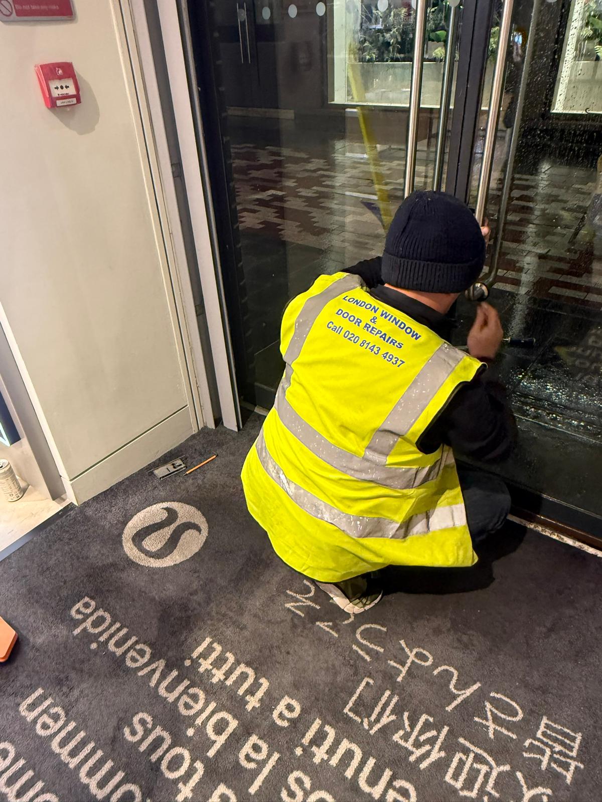 Glass-shopfront-door-refitted-and-tested-for-smooth-operation-in-Covent-Garden