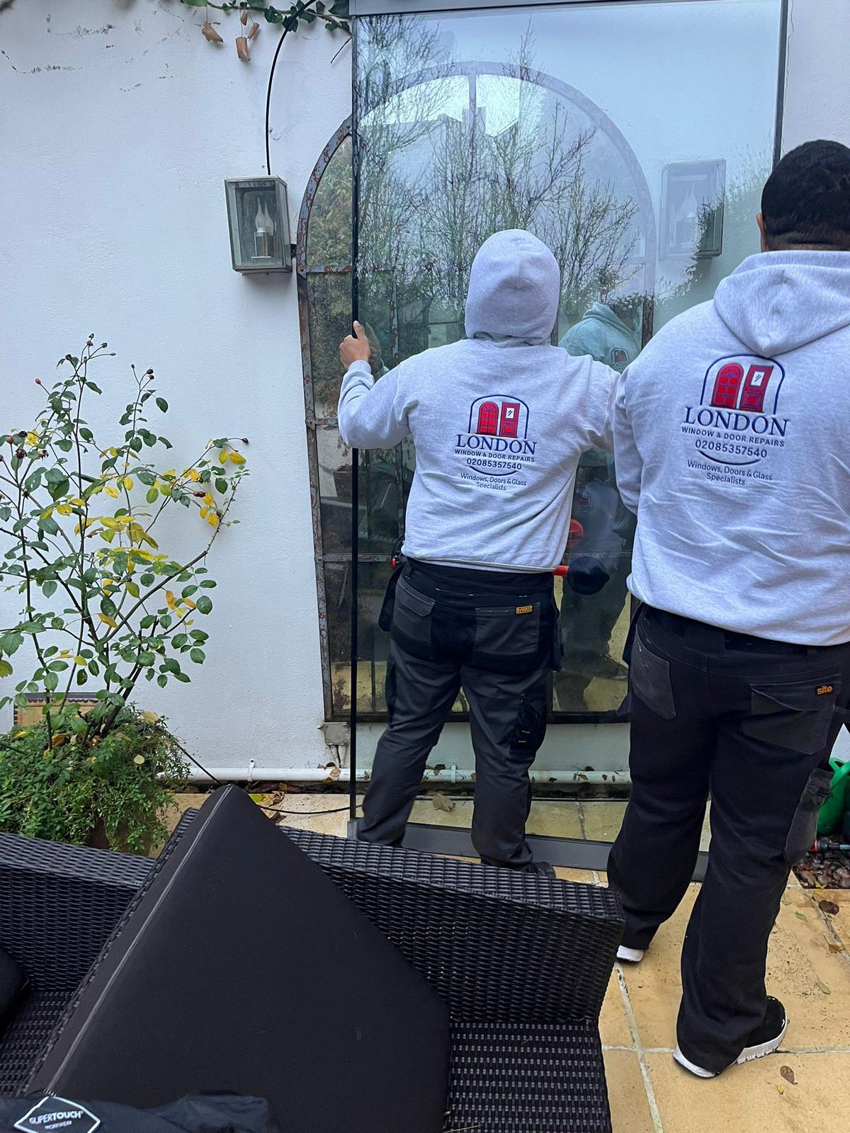 stiff and non, sliding door Alt text Large sliding glass door repair in Notting Hill West London