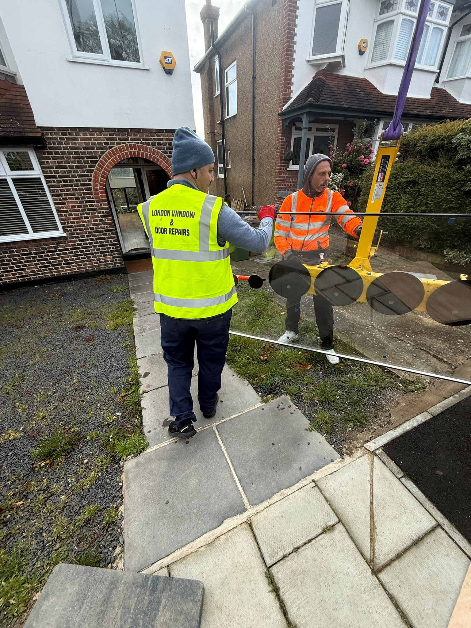 Large glass installation with crane assistance, Chelsea, London